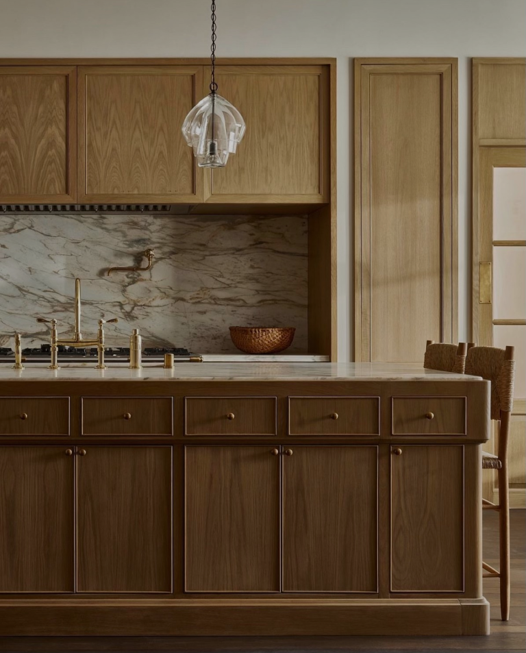 A kitchen counter with a sink and a faucet